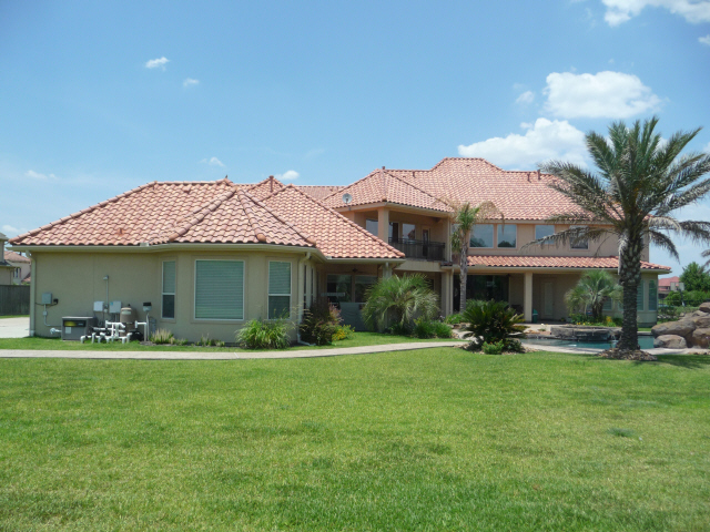 Tile Roof in Katy Texas cleaned by Katy Memorial Roof Cleaning and Power Washing on June 1st 2011