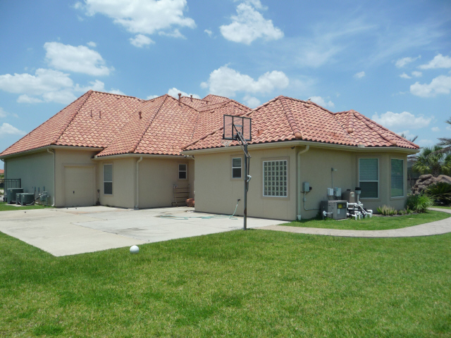 Tile Roof in Katy Texas cleaned by Katy Memorial Roof Cleaning and Power Washing on June 1st 2011