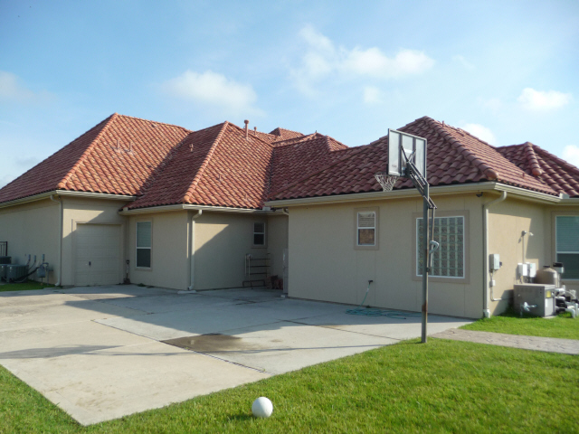 Tile Roof in Katy Texas cleaned by Katy Memorial Roof Cleaning and Power Washing on June 1st 2011